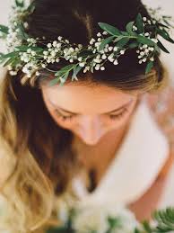a simple crown of greenery and baby s breath is about as ethereal as you can get especially wh flower crown bridesmaid bridesmaid flowers wedding hair flowers pinterest