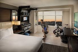 Hilton Has Designed A New Room Category For Its Full Service Brands That Brings The Fitness Center Into The Guest Roo Hotels Room Workout Rooms Urban Interiors