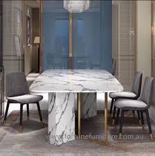 Included chairs are upholstered in a light grey fabric, brushed to ensure a soft. Pauline Marble Dining Table Fortune Furniture