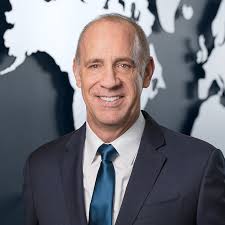 John B. Cooper, Senior Vice President, Global Government and Defense; Lt.  General, U.S. Air Force (Ret.)