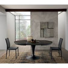 Choisir la table de sa salle à manger, c'est choisir une table qui s'accorde avec les proportions de son intérieur, mais également avec l'ambiance que l'on souhaite donner à sa salle à manger. Table Ronde Extensible Calix Meubles Et Atmosphere