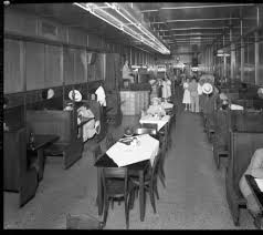 Interior Views Of The Restaurant Gargotto S Cafe With Neon Signs On The Windows Rows Of Booths And Tables And A Man Louisville University Of Louisville Photo