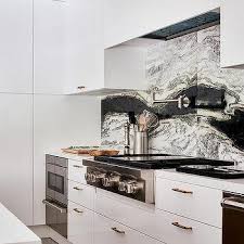 Modern kitchen in yellow and green. Sliding Backsplash Design Ideas