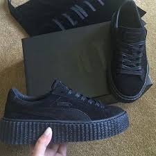 The first model features a black suede base and a creeper gum outsole which is bulkier than the usual. Rihanna Fenty Puma Black Satin Creepers Puma Rihanna Puma Creepers Pumas Shoes