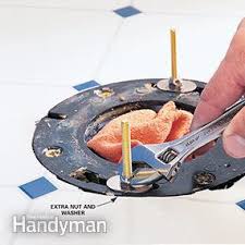 As with removing the old toilet, you'll install the new one in two pieces. How To Install A Toilet Diy Family Handyman