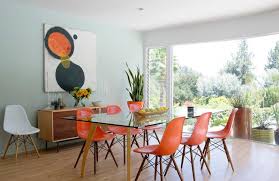 Vintage 1970s chrome dining table with large, thick, rectangle glass top. White Orange Chairs Green Walls And Light Hardwood Floors Glass Table Wall Art Mid Century Modern Dining Room Mid Century Modern Dining Set Dining Sets Modern