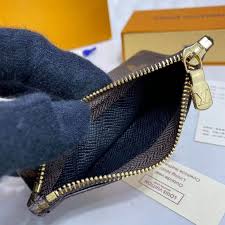 Louis vuitton purse m64012 portefeiulle braza taiga blue mens. Louis Vuitton Daisy Duck Coin Card Holder
