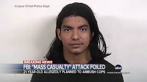 A 21-year-old who the FBI is accusing of plotting a "mass casualty attack"  against white police officers in Texas has been arrested. Authorities claim  the suspect was inspired by the 2016 massacre
