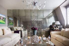 It looks stylish and is a perfect way to add shimmer to a modern interior. Glamorous Spaces With Mirrored Walls Chairish Blog