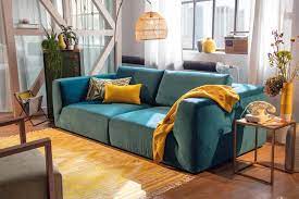 Sofa In Petrol Wohnzimmer Petrol Petrolfarbe Die Trendfarbe Zum Einrichten Home Living Room Living Room Living Room Designs