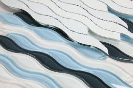 Look through wave glass tile pictures in different colors and styles and when you find some wave. Blue Wave Interlocking Tile In Glass Mosaic Tile Pool Tile Pool Rated Tile Kitchen Backsplash Bathroom Walls Shower Wall Accent Wall