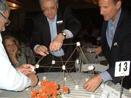 You might want to try a progressive dinner party. Progressive Networking Dinner Communication Icebreaker