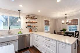 Remove wall between kitchen and dining room before and after. Big Ideas For Remodeling A Little Kitchen Space Saving Cabinetry Design A Neutral Palette Functionality Hartford Courant