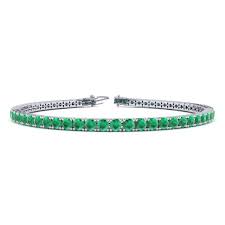 This classic womens tennis bracelet features round brilliant cut natural diamonds. Green Gemstones Emerald Bracelet May Birthstone 4 1 2 Carat Emerald Tennis Bracelet In 14 Karat White Gold 7 Inches Superjeweler