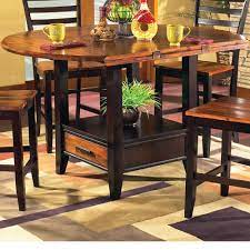 It does not come with chairs, which is par for the course with these tables as most don't. Steve Silver Abaco Ab200pt Ab200ptb Solid Wood Acacia Top Round Storage Base Counter Table With Drop Leaves Northeast Factory Direct Pub Tables