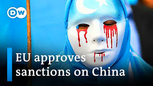 EU agrees to sanction China for human rights abuses against Uighurs | DW  News - YouTube