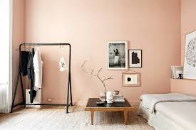 Light peach walls set a serene tone, and shades of coral and blue punctuate the space for a beachy effect. Scandinavian Interiors Interior Design Ideas House Garden
