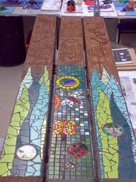 Clarey Has Lots Of Experience In Community Arts Here Are Some Totem Poles Now Installed In A Park In Sw Burnley That Clare Art Pole Mosaic Art Mosaic Crafts