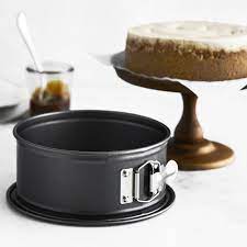 Springform pans come with an adjustable latch that can be tightened when the latch is locked in place, sealing the pan's base. Nordic Ware 7 Springform Cake Pan Williams Sonoma