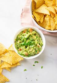 Guacamole dip is low on calories and a perfect afternoon snack. Easy Homemade Guacamole Recipe Video Mindful Avocado
