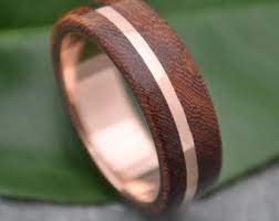 Rose Gold And Silver Un Lado Asi Wood Ring Ecofriendly 14k Recycled Rose Gold Wood Weddi In 2021 Rose Gold Wood Ring Wedding Rings Rose Gold Rose Gold Wedding Bands