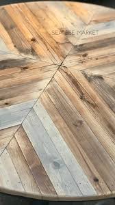 The rounded edge of the table top is inspired by the soft bending of the steel tubes, and the angle of the legs make the table top look like it is floating in the air. Herringbone Round Table Top Upcycle Sea Bee Market Diy Table Top Round Wood Table Outdoor Dining Table Diy