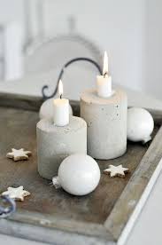 You can see them everywhere, from festive tables to mantels, the only thing you need is a proper candle holder or votive. Indigo Crossing Concrete Candle Holders Diy Concrete Candle Holders Christmas Candles