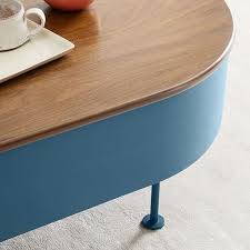 These industrial metal coffee tables add a splash of color. Ruby Storage Coffee Table Petrol Blue