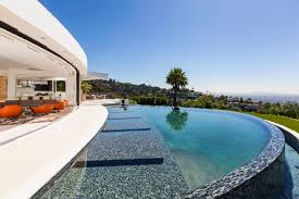 At the top of hillcrest road sits a property unlike any other in beverly hills. 1181 N Hillcrest Rd Williams Williams Estates Group