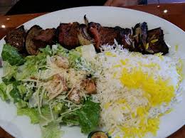 Panini Cafe Flat Iron Steak Shish Kabob W Sides Of Bastami Rice Ceasar Salad Panini Cafe Ceasar Salad Flat Iron Steak
