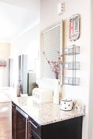 The shelf folds up against a plywood top and is an option for kitchen cabinet organizers. Family Kitchen Command Center