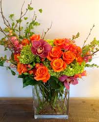 Combine orange with red and yellow florals for a fiery centerpiece or bouquet at your next event. Flirty Fleurs The Florist Blog Inspiration For Floral Designers Pink Flower Arrangements Beautiful Flower Arrangements Rose Arrangements