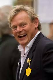 Actor Martin Clunes and wife Philippa Braithwaite pose in the Awards...