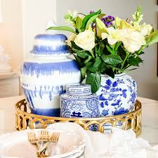 A uniquely shaped vase with a short, narrowa uniquely shaped vase with a short, narrow neck and tall, wide body. How To Decorate With Ginger Jars And Where To Find Them Randi Garrett Design