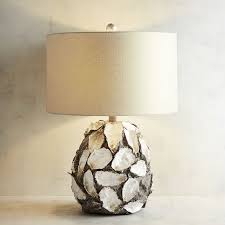 Our Faux Oyster Shell Table Lamp Brings The Ocean S Artistic Bounty Right To Your Table Soothing Color Intriguing Shimmer Table Lamp Lamp Modern Table Lamp