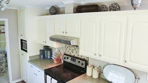 Begin by thoroughly washing grease and wax off the cabinets with tsp and water. How To Remove Furr Down Above Kitchen Cabinets Today S Homeowner Above Kitchen Cabinets Beautiful Kitchen Cabinets Kitchen Cabinets Repair