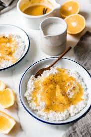 Nordisches Reisporridge Mit Vanille Gewurzter Orangensauce Rezept Orangensauce Lebensmittel Essen Rezepte