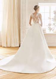 This lustrous mikado wedding gown is the epitome of effortless elegance. La Sposa Baco Mikado Ball Gown With Sheer Back Hk Dbr Weddings