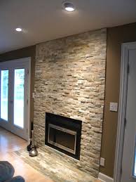 Faux stone fireplace's number of choices means there are a stone veneer profile and color palette to compliment almost any real estate or decoration style. Love This Stone Veneer Fireplace Stone Veneer Fireplace Stacked Stone Fireplaces Fireplace Wall