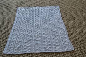 Easy seed stitch baby blanket free knitting pattern uses colorful and soft chenille bernat baby blanket yarn. A Treasured Baby Shawl For My First Grandson Knanaknits