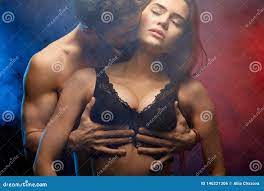 Passionate Man Hugging His Girlfriend Breast and Kissing Her Stock Photo -  Image of body, family: 146221306