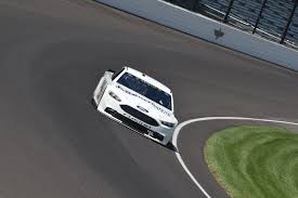 Changing tires at a pit stop is an art. Indianapolis Motor Speedway