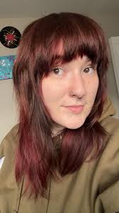 You know she cr@zy when she dye her hair red 😭