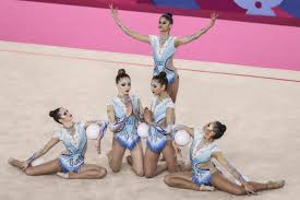 Rhythmic gymnastics is a sport in which gymnasts perform on a floor with an apparatus: Brasil Se Classifica Para Quatro Finais Na Abertura Da Ginastica Ritmica