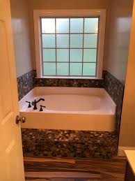 Maybe you would like to learn more about one of these? Used River Rock To Trim Garden Tub Garden Tub Master Bathroom Bathrooms Remodel
