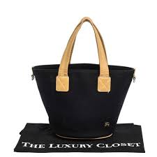 Blue label is johnny walkers current attempt to recreate the finest scotch from the original walker recipes. Burberry Blue Label Black Canvas And Leather Tote Burberry Tlc