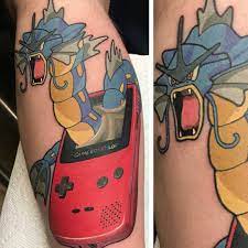 I think the one in this tattoo is a lot cooler looking Videogametatts Crazy Colourful Gameboy Colour Gyarados Tattoo