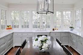 Kitchen With Only Lower White Cabinets Bank Of Windows Wood Floors Kitchen Remodel Small Home Kitchens Gorgeous White Kitchen