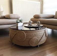how to transform an old tire into the perfect living room addition easy home decor upcycled home decor furniture decor