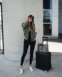 Five Holiday Travel Outfit Ideas Perfect For The Busiest Travel Time Of Year Alittleleopard Com Casual Travel Outfit Girls Bomber Jacket Airport Outfit